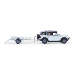 Bronco 4-Door Badlands in Cactus Grey with Utility Trailer and Motorcycle