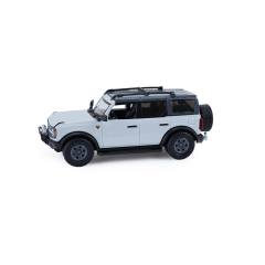 Bronco 4-Door Badlands in Cactus Grey with Utility Trailer and Motorcycle